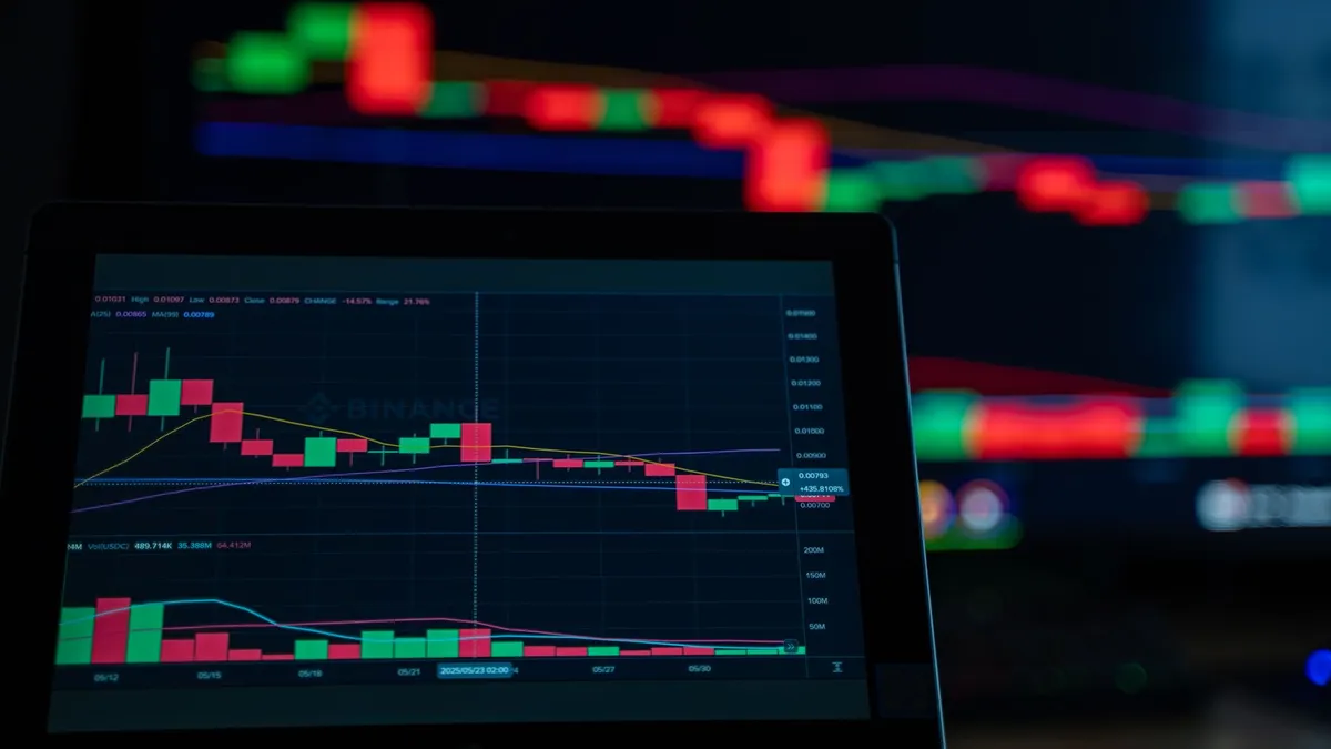 A close-up view of cryptocurrency trading charts showing a bearish trend in a digital market on a computer screen.